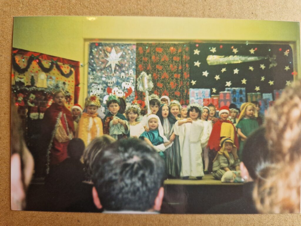 Rebecca Wilson reflects on why Mrs Roberts Dre failed to cast her, a real Jew, as Mary in Ysgol Cwm-y-Glo’s nativity play. The picture shows children aged 3-5 approximately, involved in their school's nativity play. The text is a reflection on jewish identity.