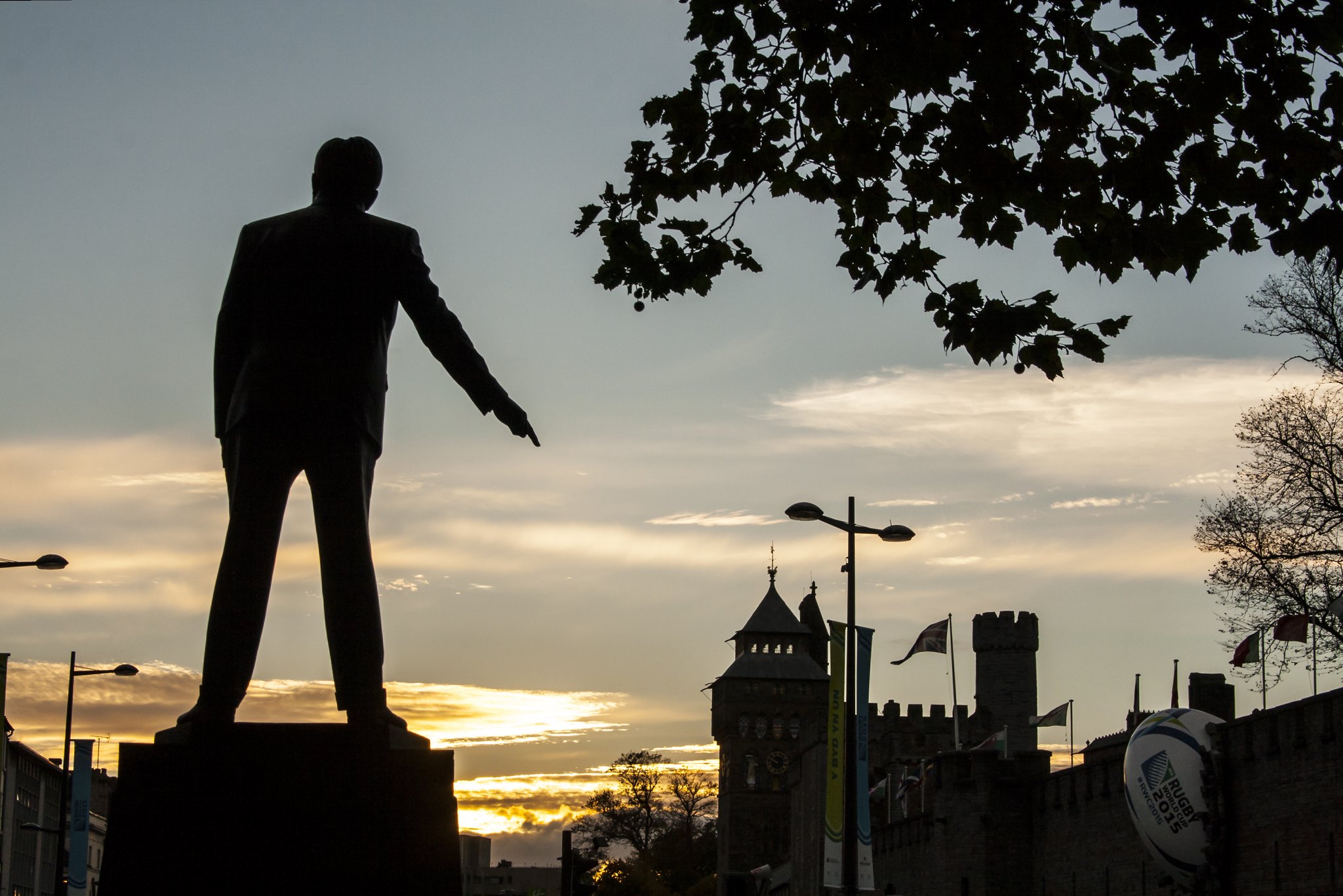 The statue of Aneurin Bevan pointing its finger at Cardiff Castle.
