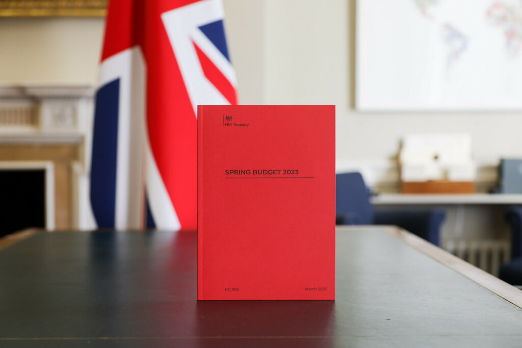 Photo of the red Spring Budget 2023 book ahead of the Budget in HM Treasury
