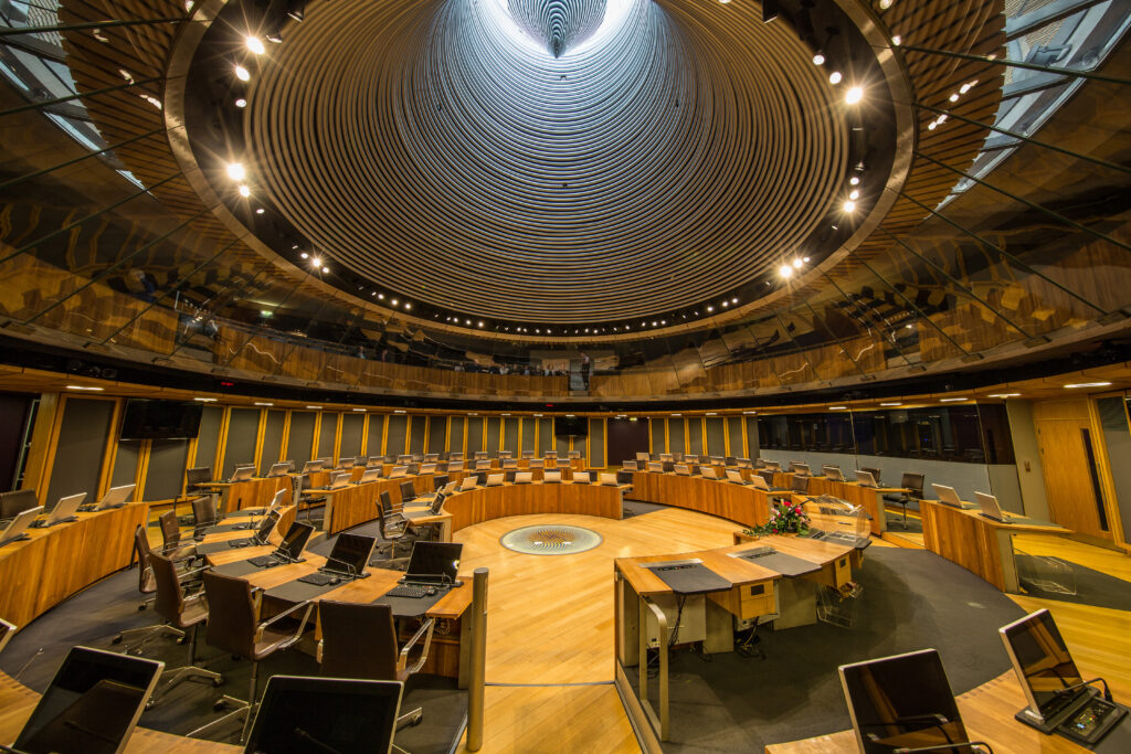 A picture of the Senedd Siambr seen from the inside. The article describes the work of the Reform Bill Senedd Committee and explains the importance of legislative scrutiny.