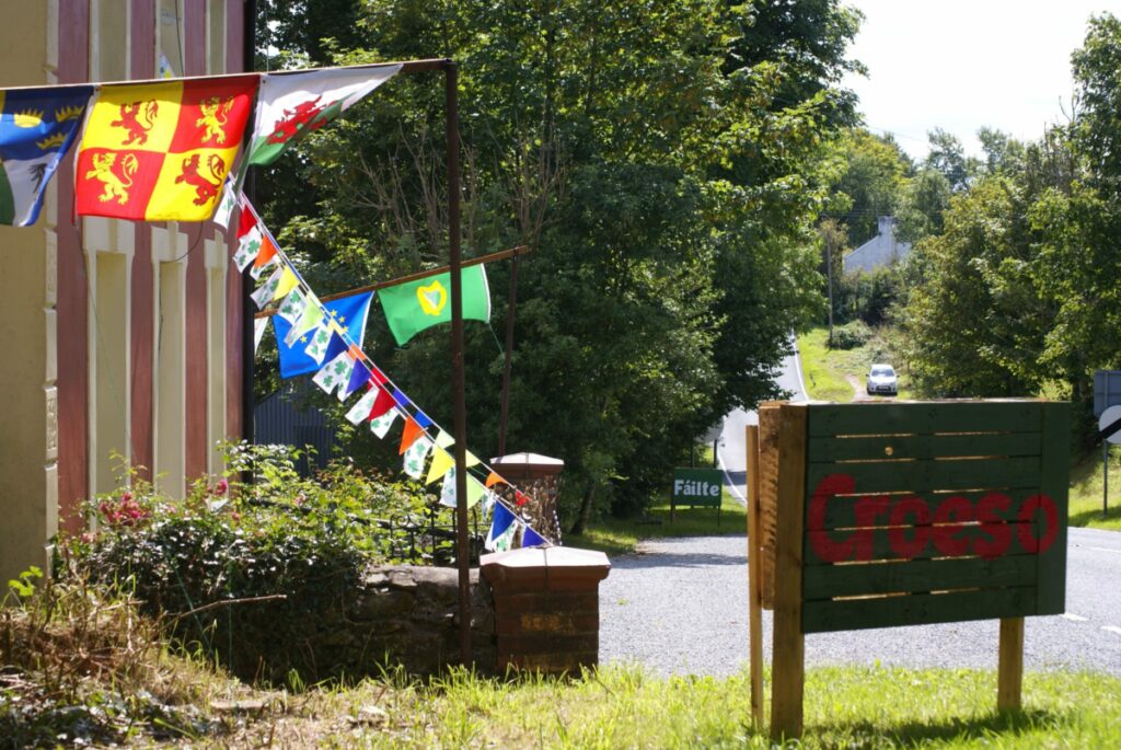 A picture of the Croeso sign and bunting welcoming newcomers to the Eisteddfod.